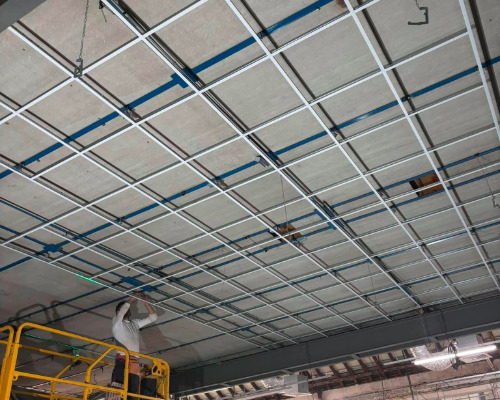 Pose de faux plafond pour entreprise tertiaire et industrie près de Béthune